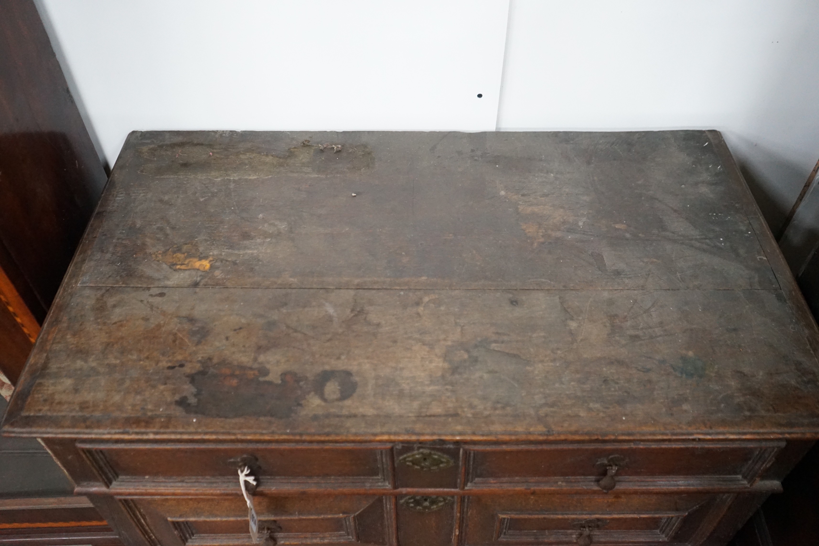 A 17th century oak chest of four drawers, width 93cm, depth 53cm, height 91cm